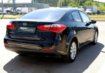 Подержанный автомобиль Kia Cerato Sedan 2013 года (6 фото)
