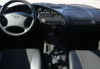 Подержанный автомобиль Chevrolet Niva 2009 года (12 фото)