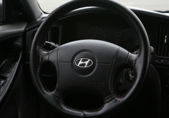 Подержанный автомобиль Hyundai Elantra Sedan 2006 года (16 фото)