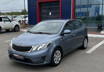 Подержанный автомобиль Kia Rio Hatchback 2014 года (7 фото)