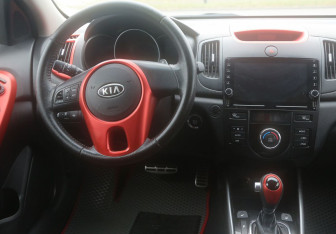 Подержанный автомобиль Kia Cerato Sedan 2011 года (14 фото)