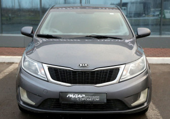 Подержанный автомобиль Kia Rio Hatchback 2014 года (2 фото)