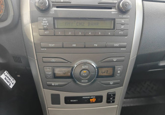 Подержанный автомобиль Toyota Corolla Sedan 2006 года (16 фото)