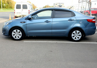 Подержанный автомобиль Kia Rio Sedan 2013 года (8 фото)