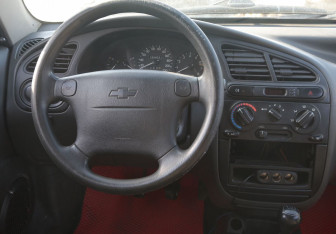 Подержанный автомобиль Chevrolet Lanos 2009 года (14 фото)