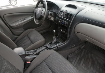 Подержанный автомобиль Nissan Almera Classic 2010 года (9 фото)