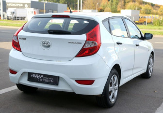 Подержанный автомобиль Hyundai Solaris Hatchback 2013 года (6 фото)