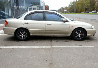 Подержанный автомобиль Kia Spectra Sedan 2009 года (7 фото)