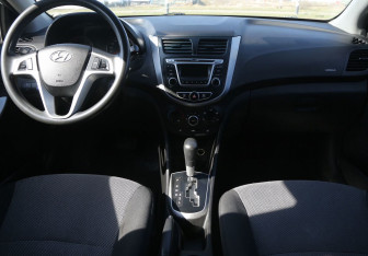 Подержанный автомобиль Hyundai Solaris Sedan 2013 года (12 фото)