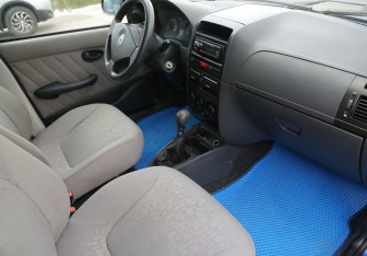 Подержанный автомобиль Fiat Albea 2011 года (9 фото)