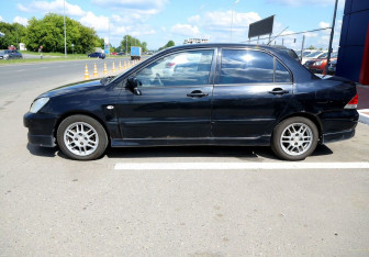 Подержанный автомобиль Mitsubishi Lancer Sedan 2006 года (8 фото)