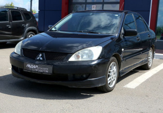 Подержанный автомобиль Mitsubishi Lancer Sedan 2006 года (3 фото)