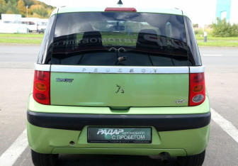 Подержанный автомобиль Peugeot 1007 2006 года (5 фото)