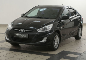 Подержанный автомобиль Hyundai Solaris Sedan 2013 года (8 фото)