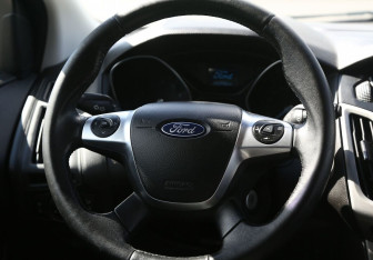 Подержанный автомобиль Ford Focus Hatchback 2014 года (16 фото)