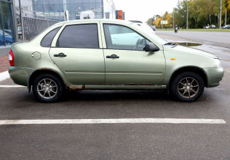Подержанный автомобиль LADA (ВАЗ) Kalina Sedan 2010 года (7 фото)