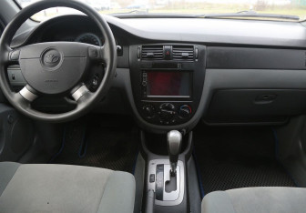 Подержанный автомобиль Daewoo Gentra Sedan 2014 года (12 фото)