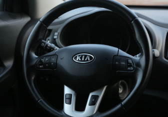 Подержанный автомобиль Kia Sportage 2012 года (16 фото)