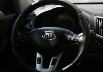 Подержанный автомобиль Kia Sportage 2012 года (19 фото)
