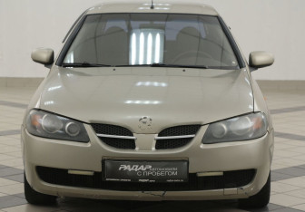 Подержанный автомобиль Nissan Almera Hatchback 2004 года (6 фото)