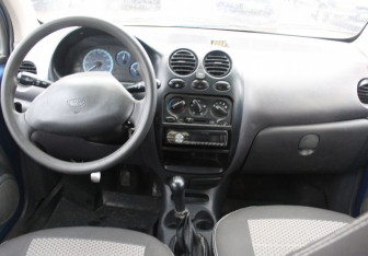 Подержанный автомобиль Daewoo Matiz 2012 года (11 фото)