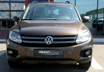Подержанный автомобиль Volkswagen Tiguan 2014 года (2 фото)