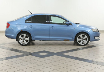 Подержанный автомобиль Skoda Rapid Liftback 2014 года (5 фото)