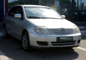 Подержанный автомобиль Toyota Corolla Sedan 2004 года (1 фото)