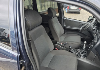 Подержанный автомобиль Chevrolet Niva 2011 года (11 фото)