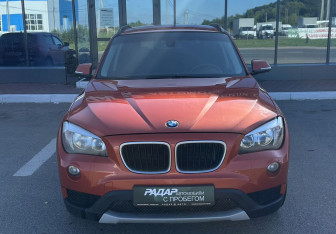 Подержанный автомобиль BMW X1 2013 года (2 фото)