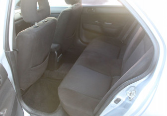 Подержанный автомобиль Mitsubishi Lancer Sedan 2005 года (12 фото)