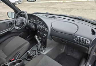 Подержанный автомобиль Chevrolet Niva 2011 года (10 фото)