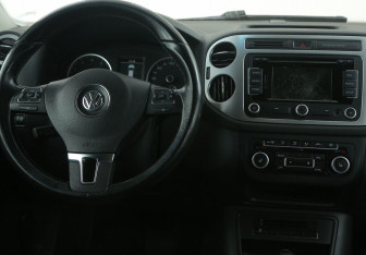 Подержанный автомобиль Volkswagen Tiguan 2013 года (14 фото)