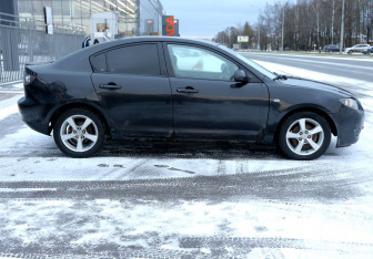 Подержанный автомобиль Mazda 3 Sedan 2006 года (7 фото)