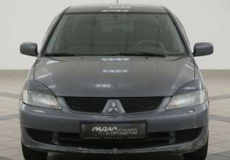 Подержанный автомобиль Mitsubishi Lancer Sedan 2006 года (6 фото)