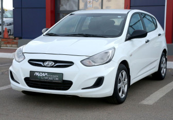 Подержанный автомобиль Hyundai Solaris Hatchback 2013 года (3 фото)
