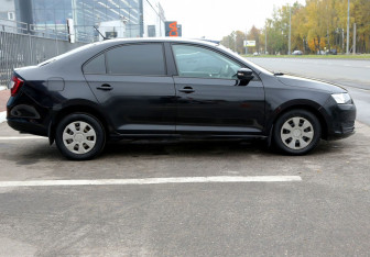 Подержанный автомобиль Skoda Rapid Liftback 2018 года (7 фото)