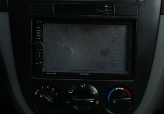 Подержанный автомобиль Chevrolet Lacetti Sedan 2011 года (13 фото)