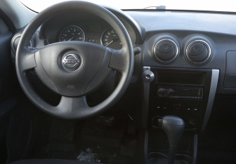 Подержанный автомобиль Nissan Almera Sedan 2013 года (15 фото)