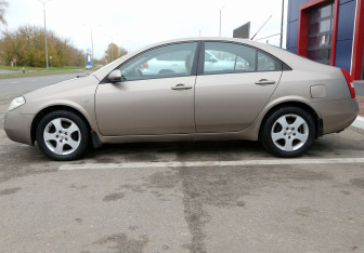 Подержанный автомобиль Nissan Primera Sedan 2004 года (8 фото)