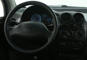 Подержанный автомобиль Daewoo Matiz 2010 года (14 фото)