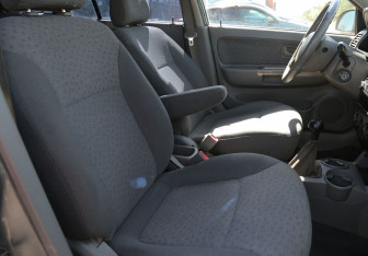 Подержанный автомобиль Kia Rio Wagon 2004 года (10 фото)