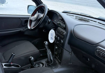 Подержанный автомобиль Chevrolet Niva 2012 года (9 фото)