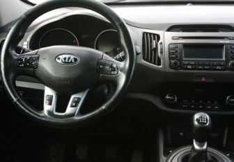 Подержанный автомобиль Kia Sportage 2014 года (14 фото)