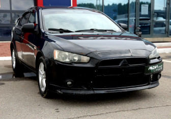 Подержанный автомобиль Mitsubishi Lancer Sedan 2008 года (1 фото)