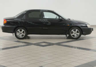 Подержанный автомобиль Kia Spectra Sedan 2006 года (5 фото)