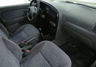 Подержанный автомобиль Kia Spectra Sedan 2006 года (9 фото)