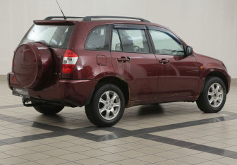 Подержанный автомобиль Chery Tiggo (T11) 2012 года (4 фото)