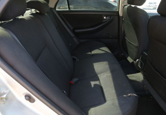 Подержанный автомобиль Toyota Corolla Sedan 2004 года (11 фото)