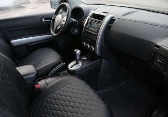 Подержанный автомобиль Nissan X-Trail 2013 года (9 фото)